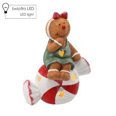 Figurka bożonar. - medenjakov možic, ki sedi na bonbonu 26,5 x 15 x 35 cm led *0981